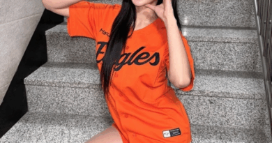 Woo Soo han charms with her stunning smile and perfect long legs in Hanwha Eagles uniform
