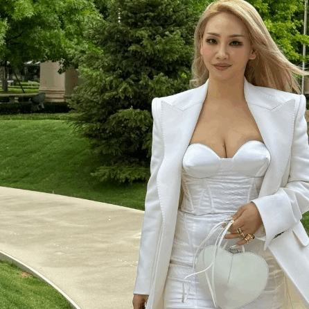 Kpop star CL wears elegant white dress at luxury brand event
