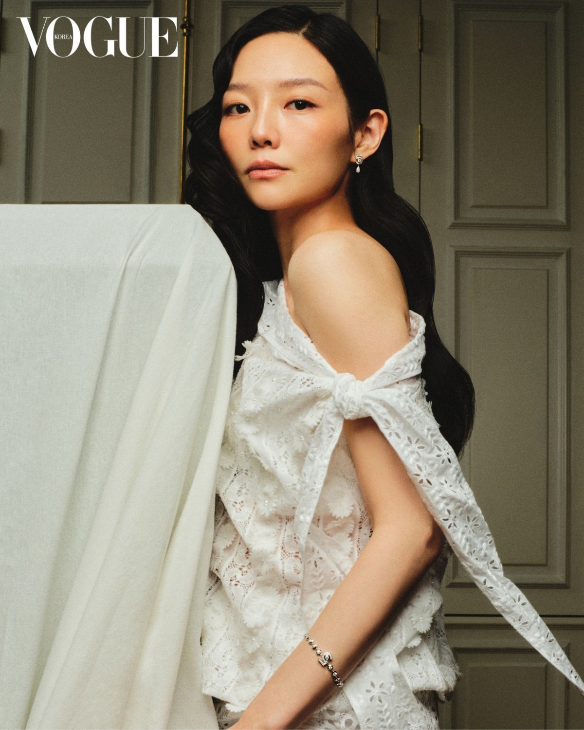 Esom showcases her powerful charisma through unique expressions and poses in Vogue Korea