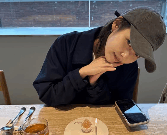 IU shares birthday celebration photos and news about her upcoming album