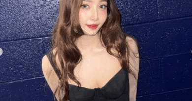 Red Velvet Joy showcases chic black dress and radiant smile on social media