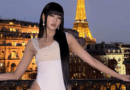 Minnie of GIDLE stuns in white monokini with Eiffel Tower backdrop