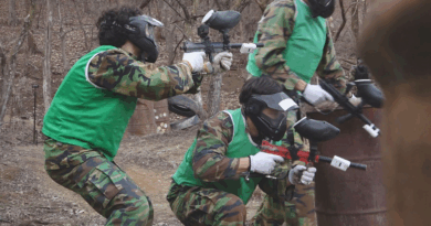Portuguese and Korean students clash in paintball game on reality show