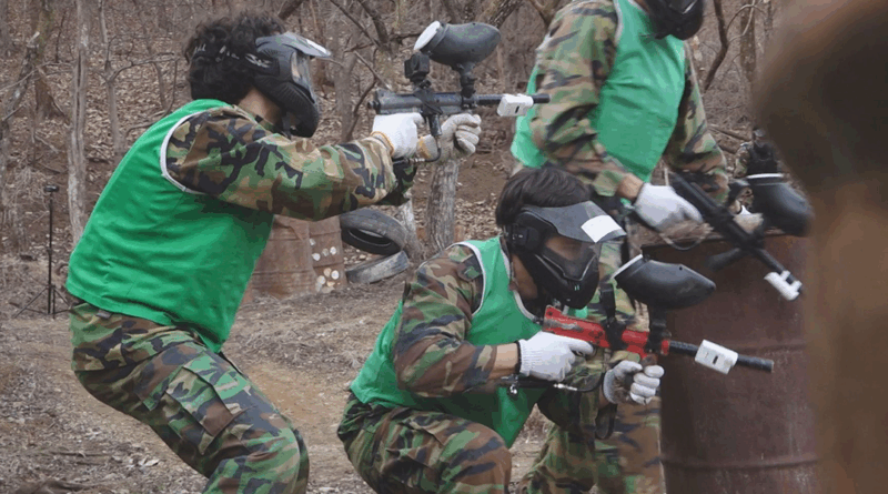 Portuguese and Korean students clash in paintball game on reality show