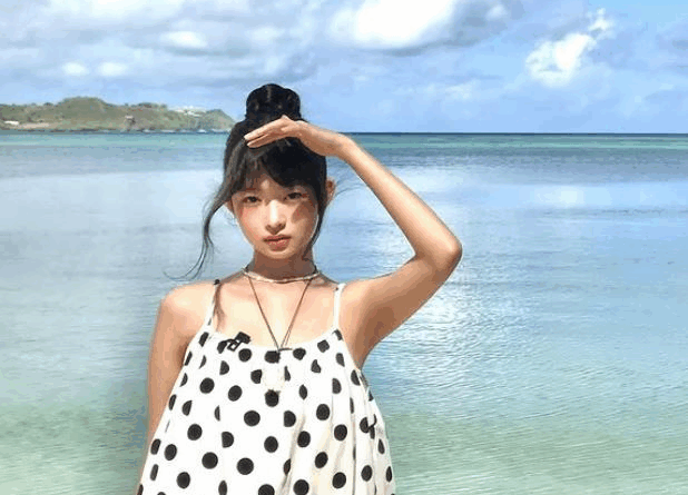 Ray showcases summer beach fashion in Guam with effortless chic look