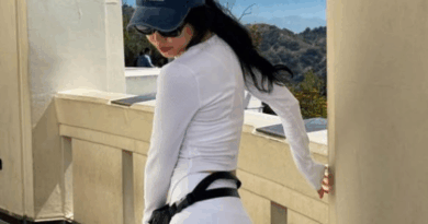 Son Naeun shows off sporty fashion in white biker shorts during LA trip