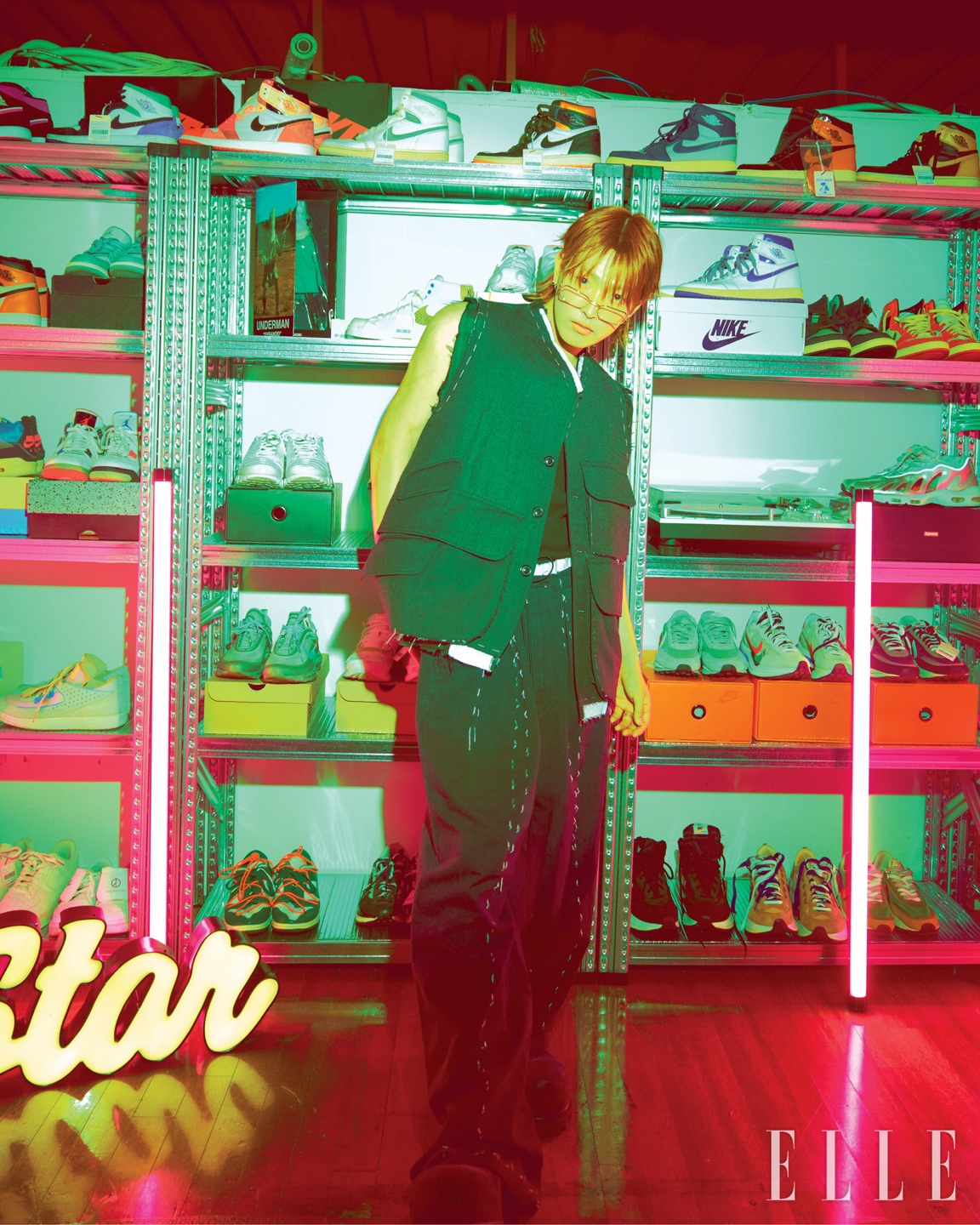 Hongjoong of ATEEZ discusses fashion insights and world tour excitement with Elle Magazine.