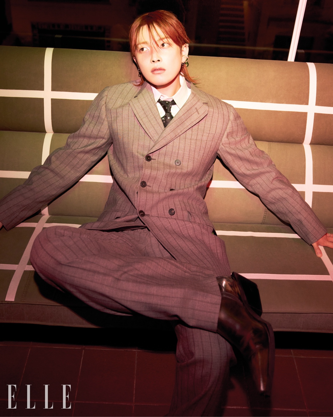 Exclusive look at ATEEZ Hongjoong's fashion-forward photoshoot and candid interview.