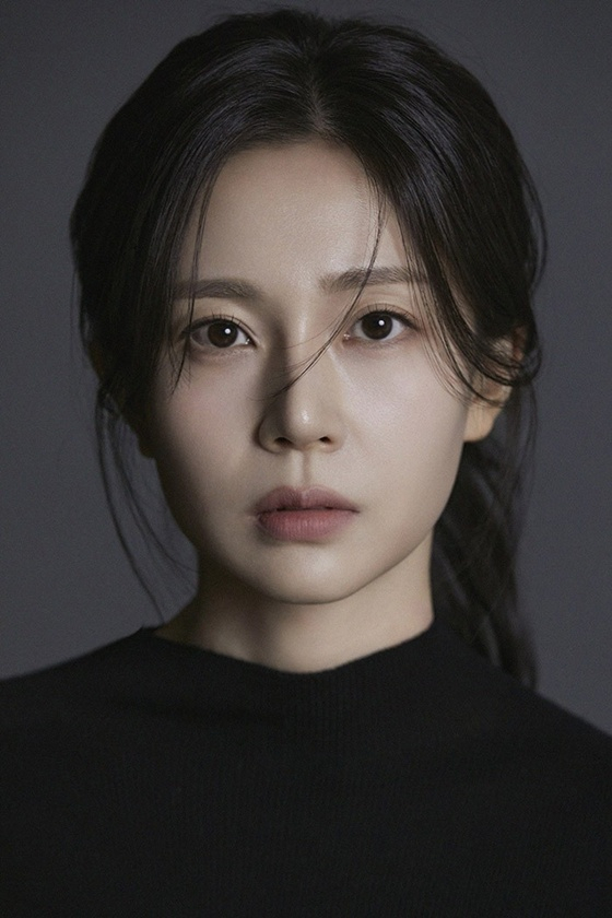 Explore Baek Jin-hee's evolution with her latest profile images showcasing her maturity.
