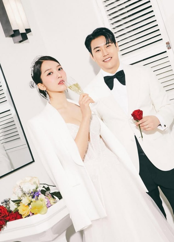 Do Hwa joyfully shares wedding preparations and photos with her husband.