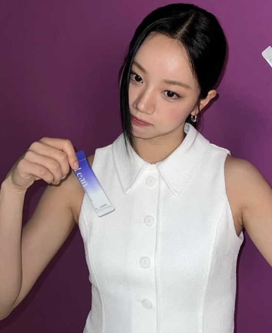 Hyeri showcases diverse charm with diet products in a social media post.