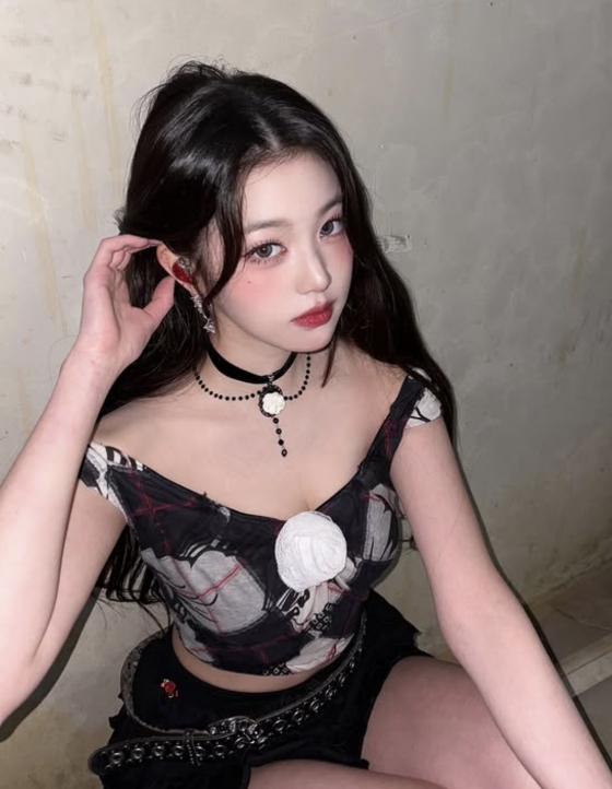 Jang Wonyoung's captivating gothic look in her new photoshoot.
