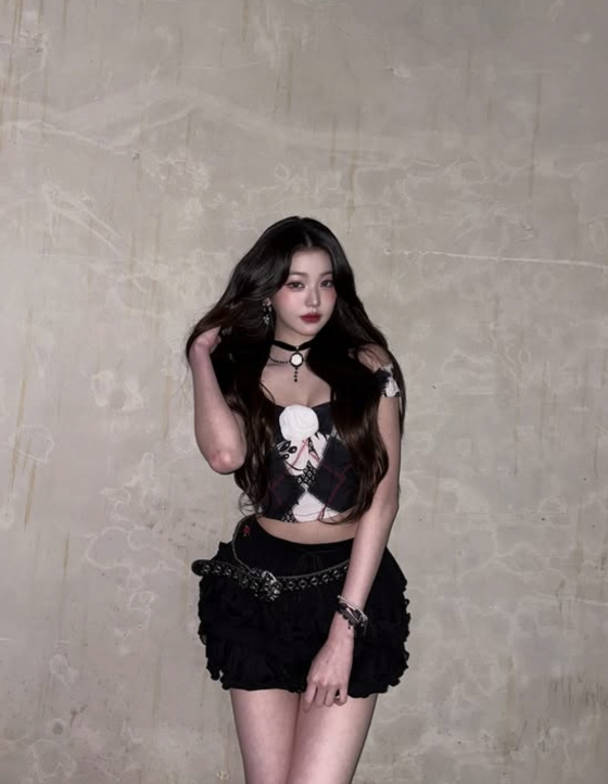 Jang Wonyoung of IVE showcases a mesmerizing gothic style in recent photos.