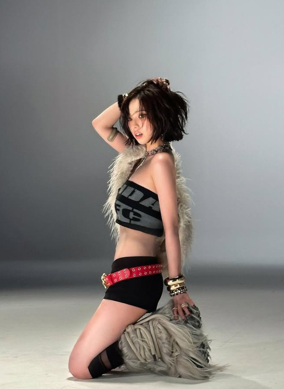 Aespa's Karina captivates with unconventional style in latest album shoot.