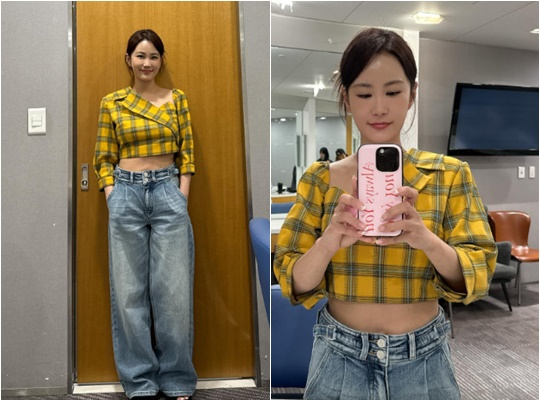 Jimin Kim looks stunning in a chic crop top paired with jeans