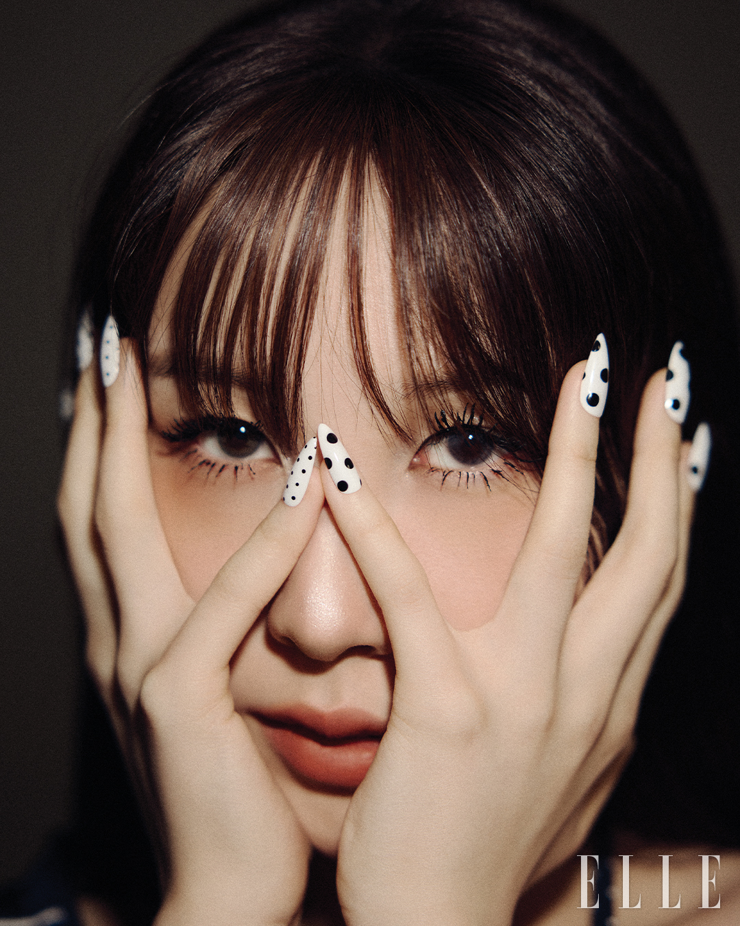 Singer Kwon Jin-ah discusses her musical journey in a feature by ELLE.