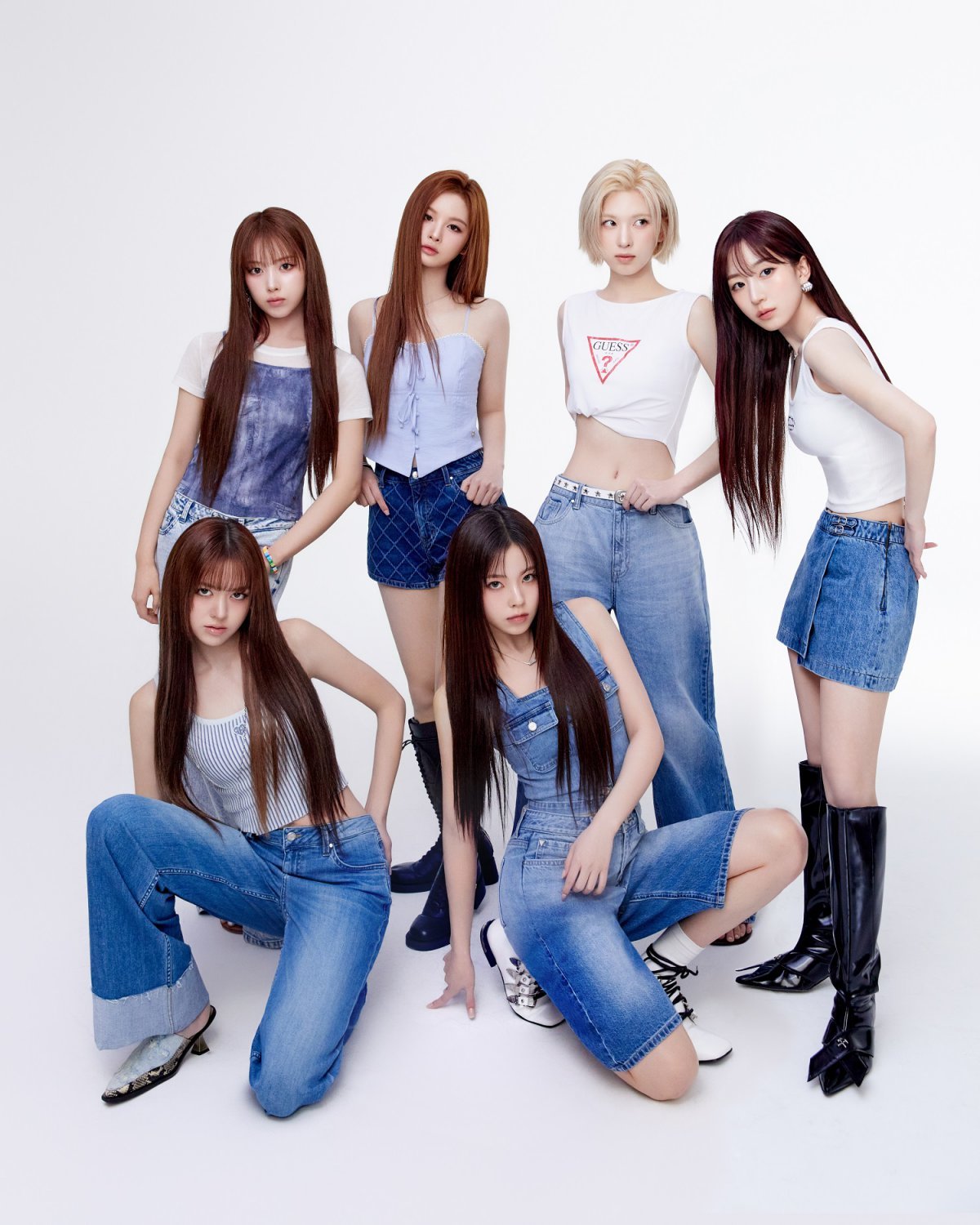 Nmixx models for GUESS summer campaign in iconic denim looks.