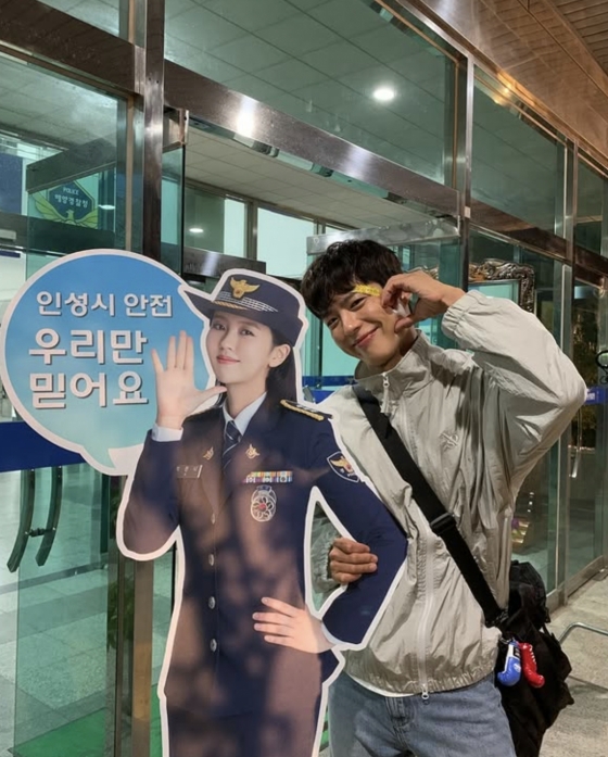 Behind-the-scenes images of Park Bo-gum on Good Boy set with co-star cutout