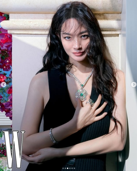W KOREA features Shin Min-a in a bold and sexy photoshoot emphasizing her elegance.