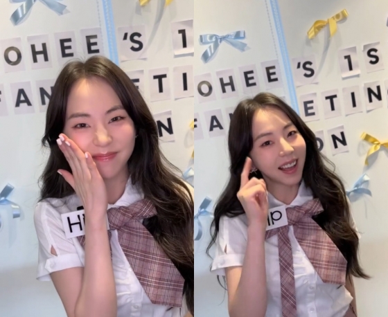 K-Pop star Sohee performs old hits at a special fan event celebrating her career.
