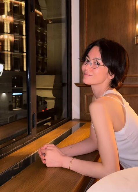 Song Hye-kyo captivates with her fashion sense during Madrid visit for Netflix filming.