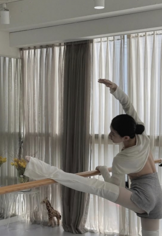Suzy captivates fans with her ballet practice, showcasing elegance and poise.