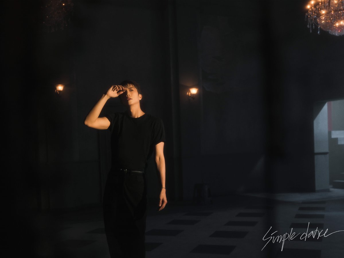 Kpop artist Wooyoung reveals emotional concept photos for Simple Dance comeback.